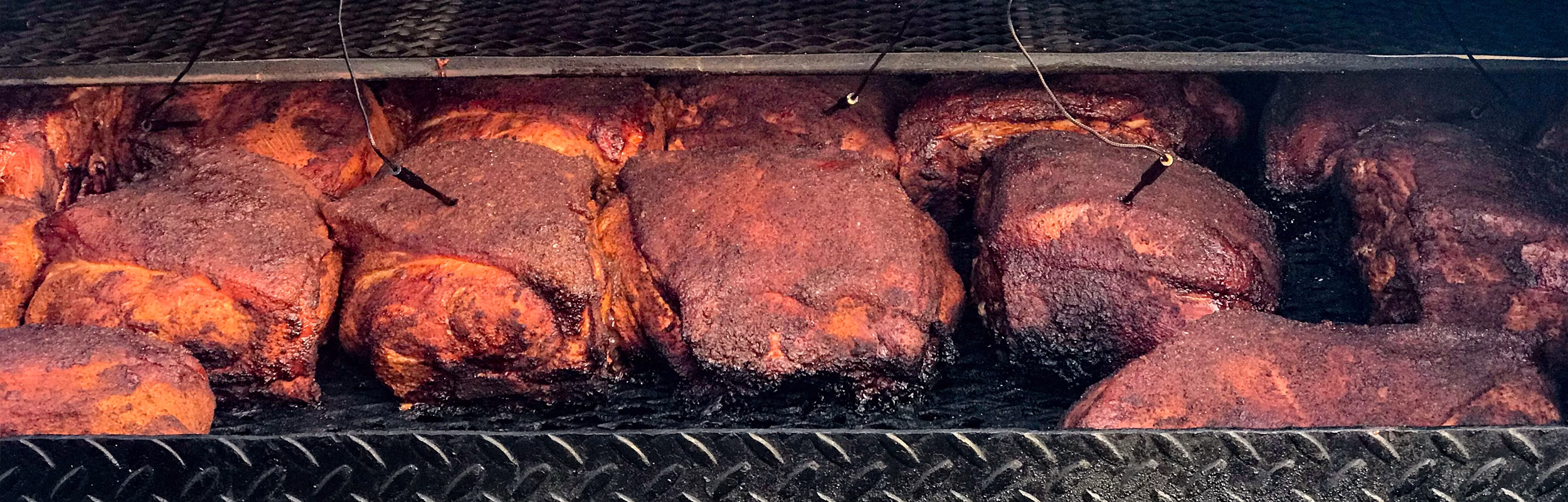 Barbeque brisket on the grill from Brewhouse BBQ in Sturgis, MI